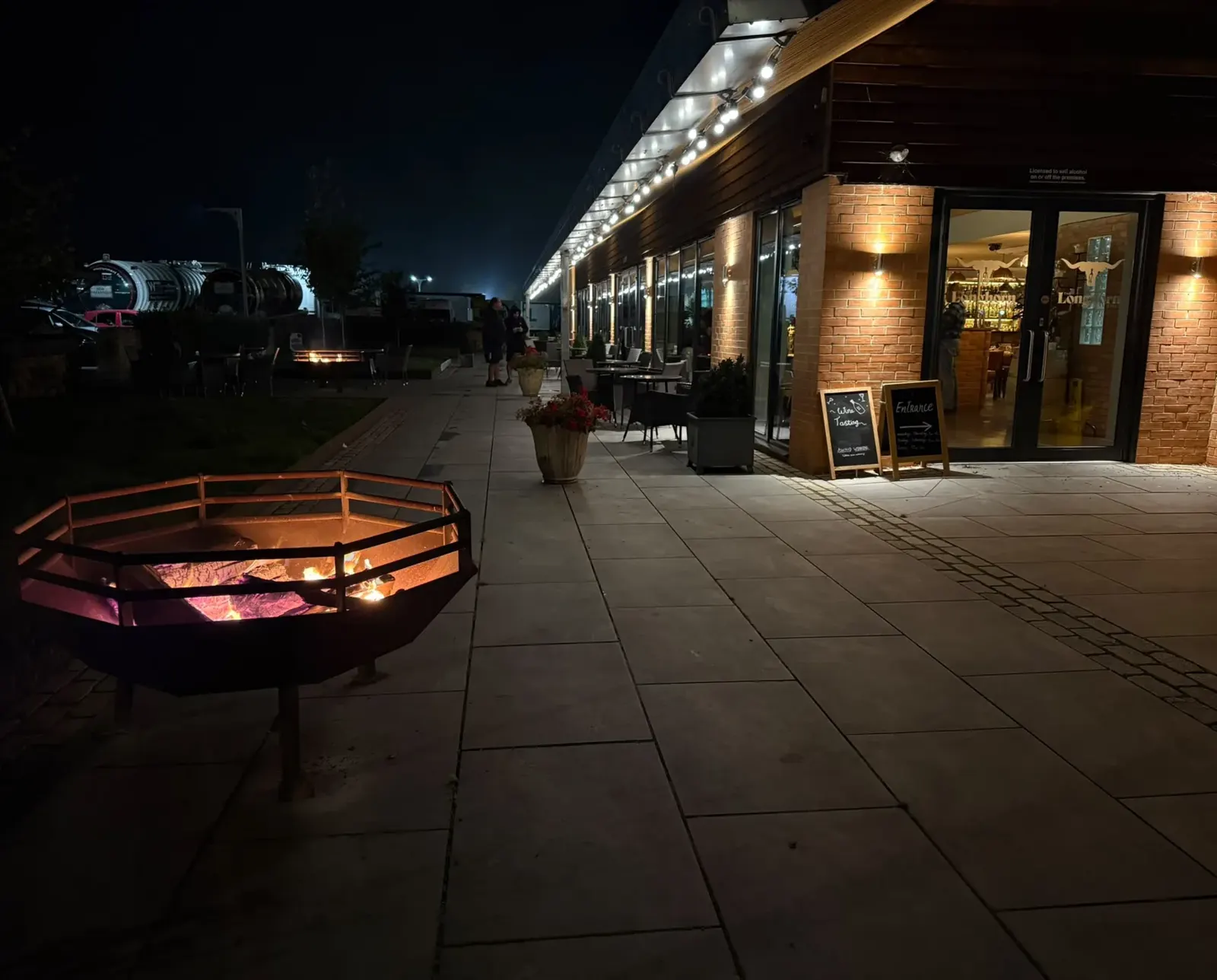 The Longhorn Bar & Grill entrance at night